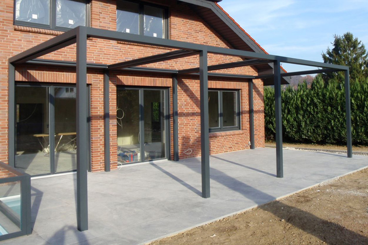 Pergola alu maison brique